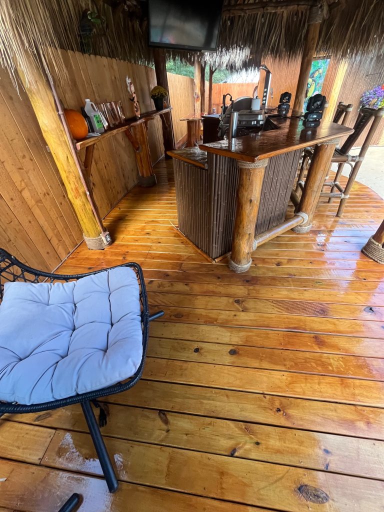 Beautiful wooden deck after being soft washed by PressurePerfect Pros, LLC in Clear Lake Shores, TX